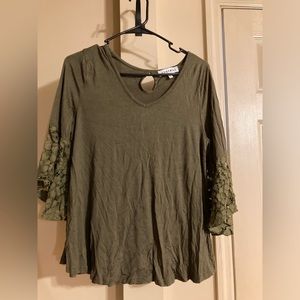 Women’s dark green top
